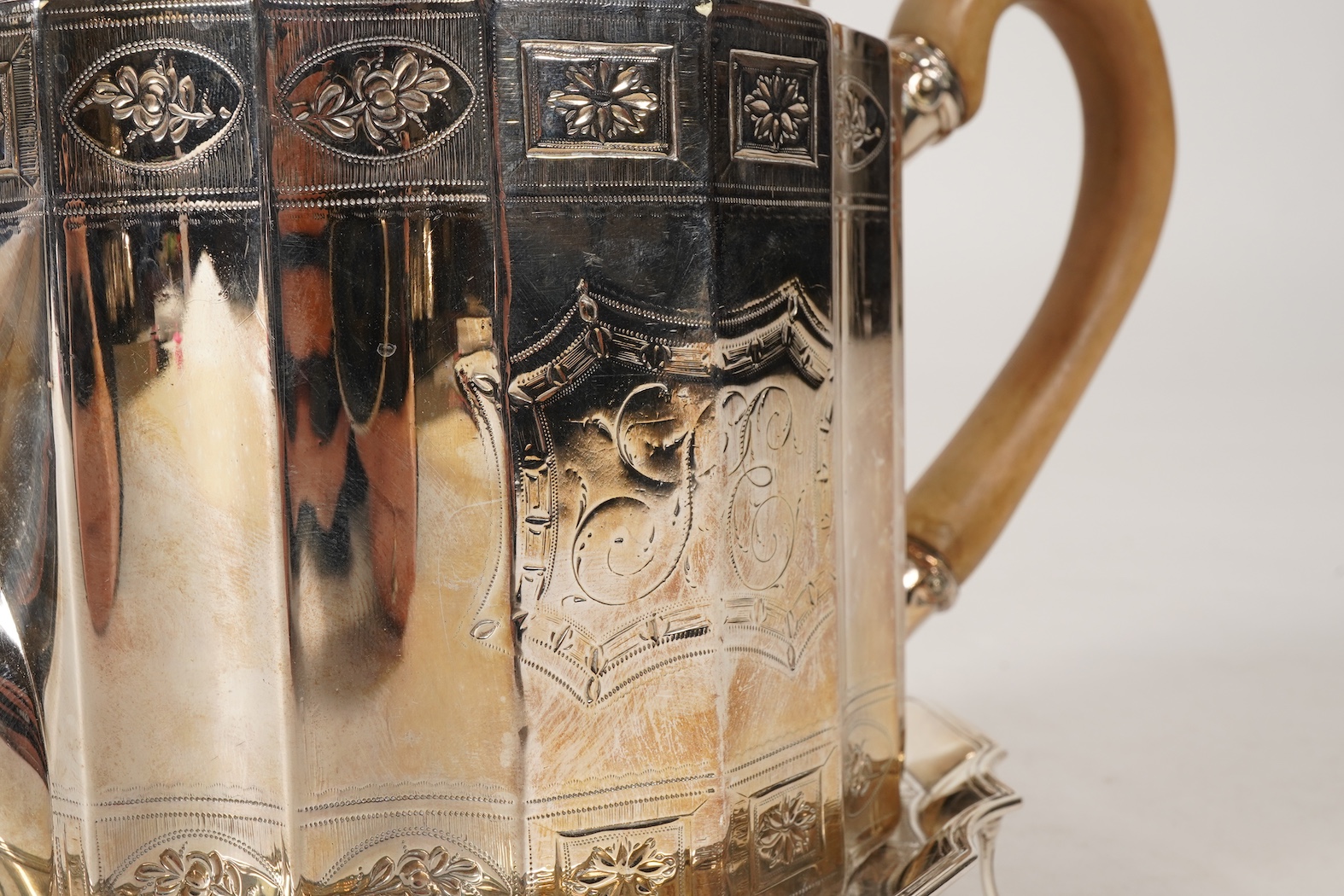 A George III bright cut engraved silver teapot and matching stand by Robert Hennell I